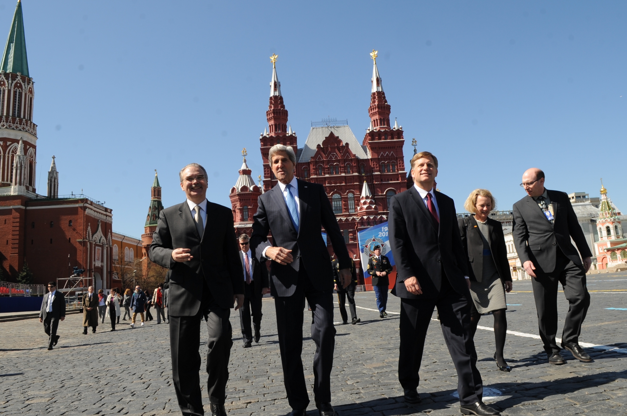 U.S. Secretary of State John Kerry, accompanied by U.S Ambassador to Russia Michael McFaul, right, and Russian Chief of Protocol Yuriy Filatov, left, tours Red Square during his visit to Moscow, Russia, on May 7, 2013. [State Department photo/ Public Domain]