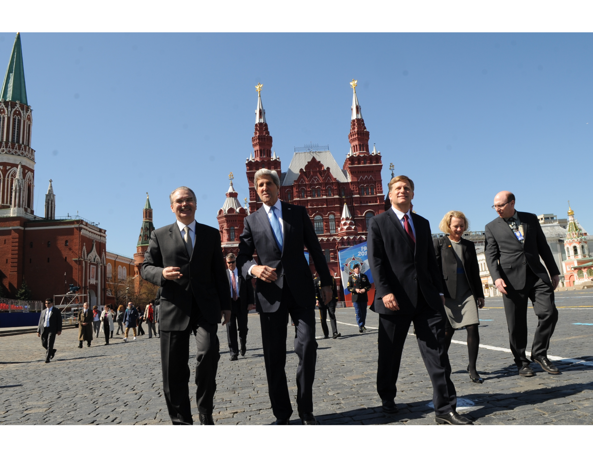 U.S. Secretary of State John Kerry, accompanied by U.S Ambassador to Russia Michael McFaul, right, and Russian Chief of Protocol Yuriy Filatov, left, tours Red Square during his visit to Moscow, Russia, on May 7, 2013. [State Department photo/ Public Domain]